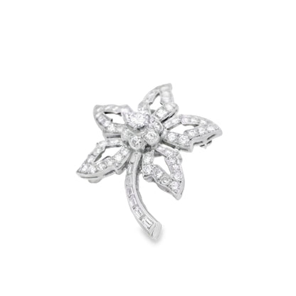 Platinum Star Brooch Featuring a Delicate Floral Design with a Round Brilliant Diamond