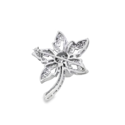 Platinum Star Brooch Featuring a Delicate Floral Design with a Round Brilliant Diamond