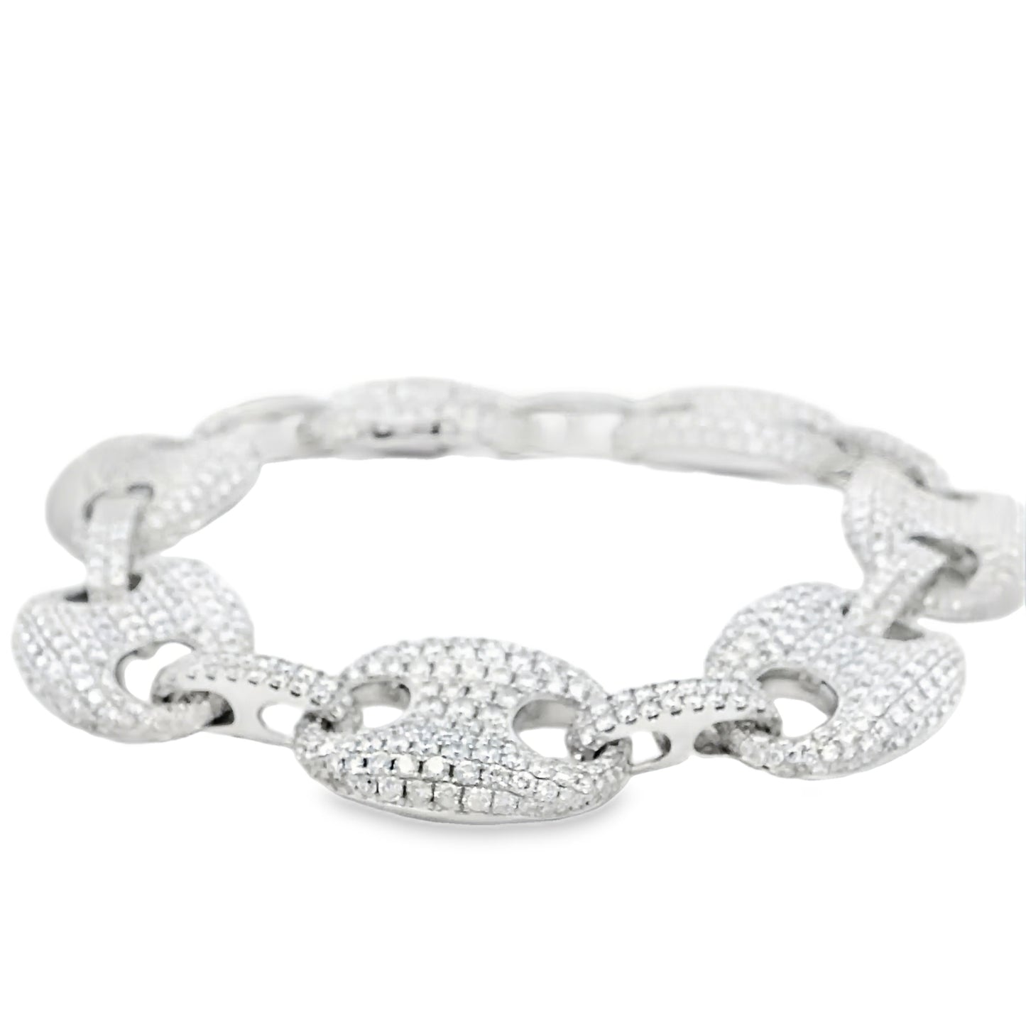 Silver bracelet with interlocking links on a white background