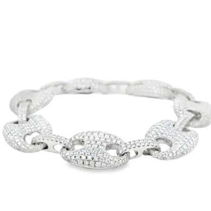 Silver bracelet with interlocking links on a white background