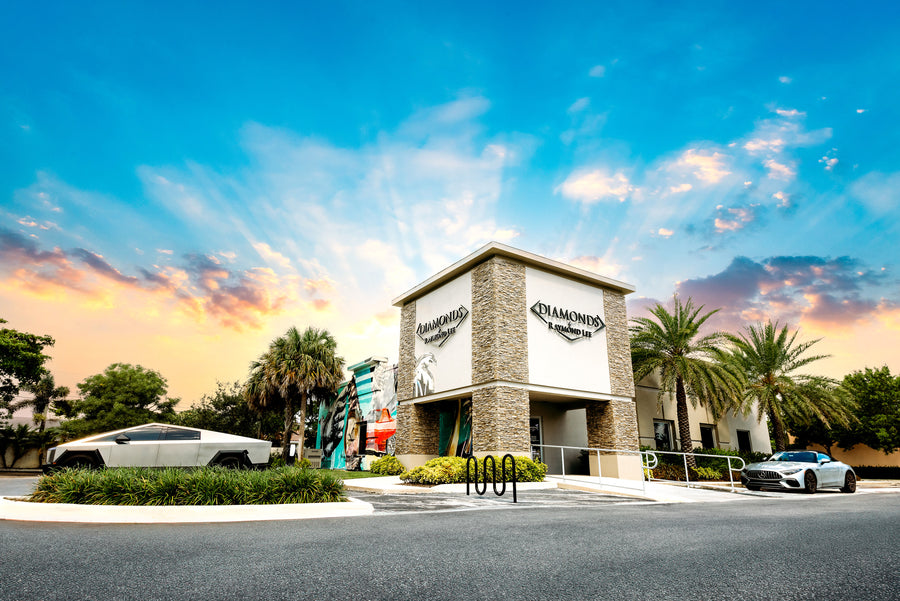 Diamonds By Raymond Lee showroom exterior at sunset