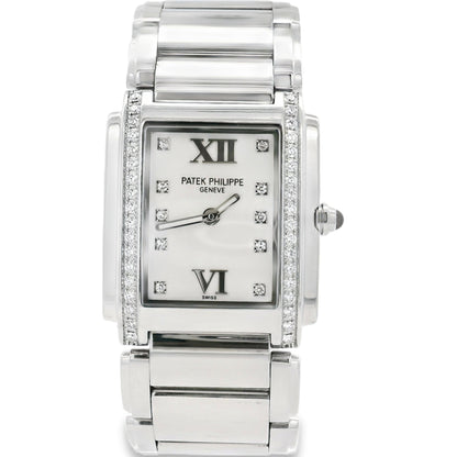 Patek Philippe watch with diamond-studded face on a white background