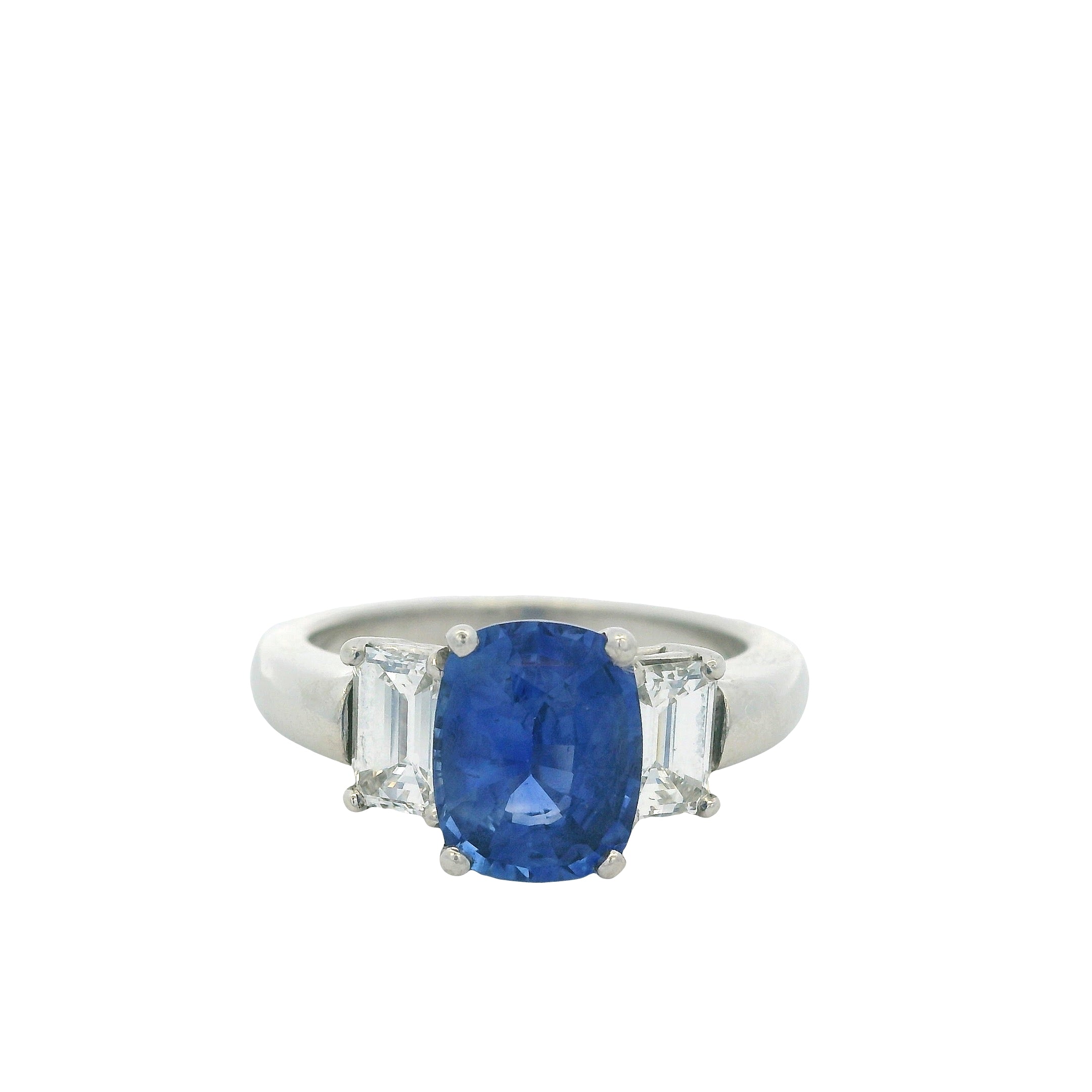 Platinum 3 Stone Ring set with Natural Cushion Blue Sapphire and Emerald Cut Diamond Side Stones