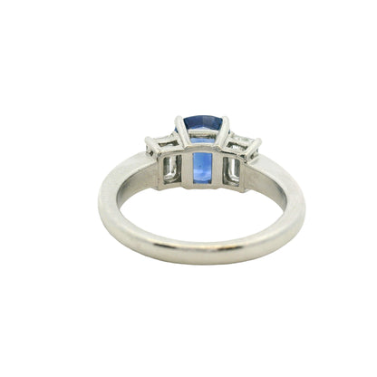 Platinum 3 Stone Ring set with Natural Cushion Blue Sapphire and Emerald Cut Diamond Side Stones