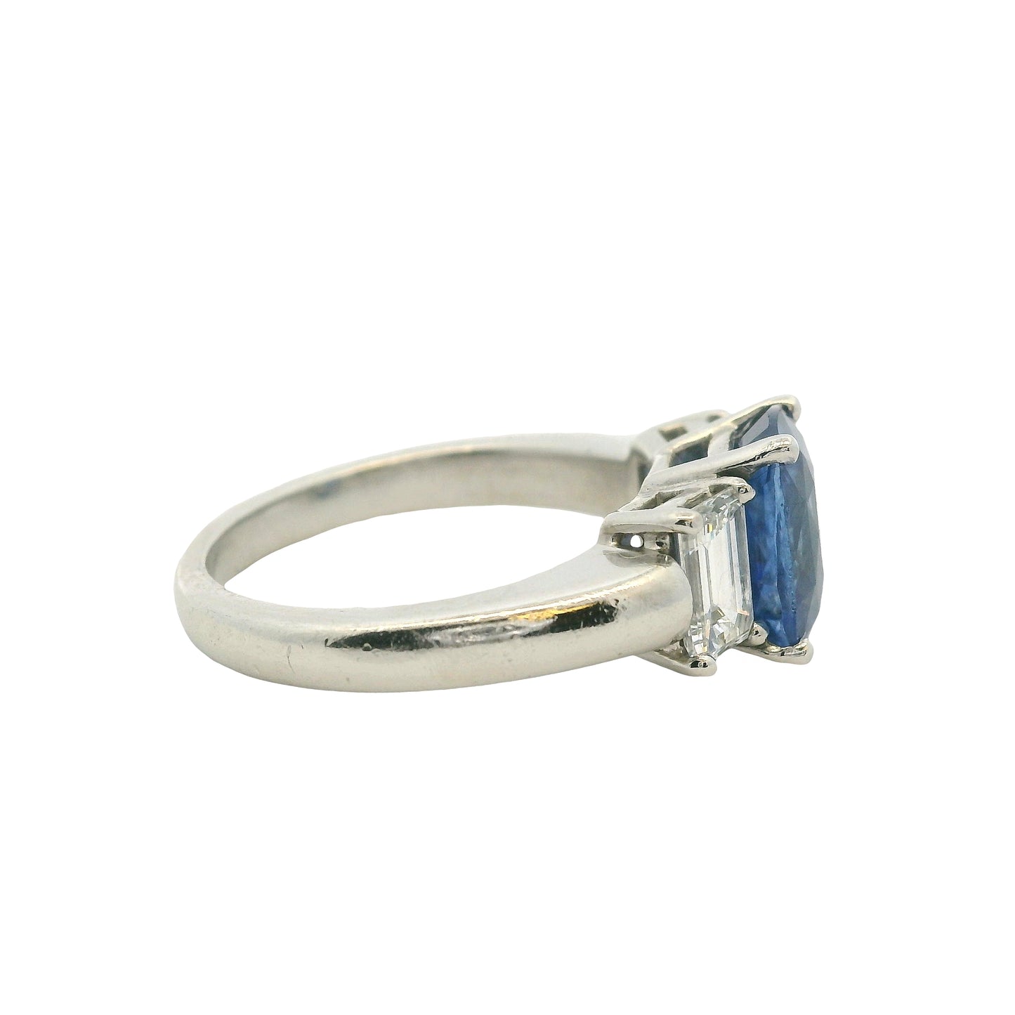 Platinum 3 Stone Ring set with Natural Cushion Blue Sapphire and Emerald Cut Diamond Side Stones