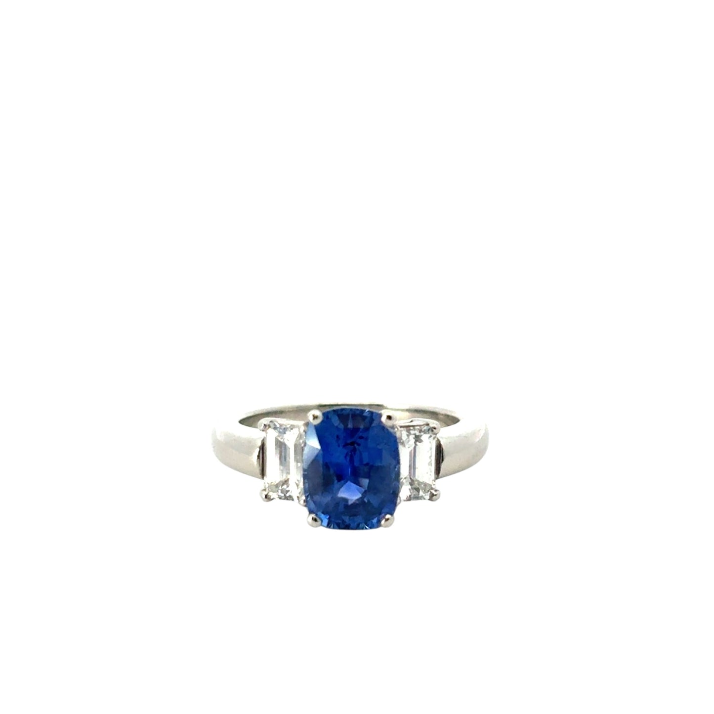 Platinum 3 Stone Ring set with Natural Cushion Blue Sapphire and Emerald Cut Diamond Side Stones