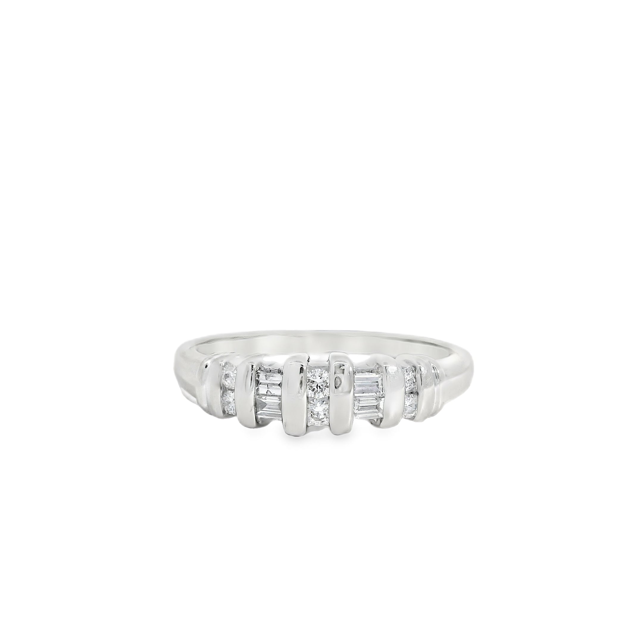 Diamond ring with baguette and round cut diamonds on a white background
