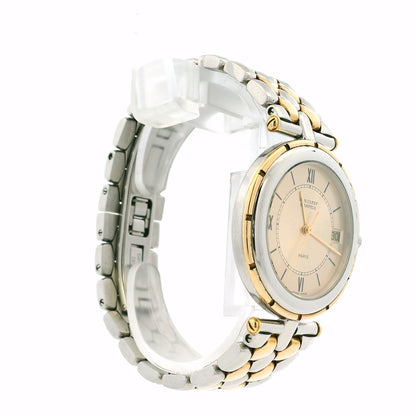 Van Cleef & Arpels 18k Yellow Gold and Stainless Steel Champagne Dial Watch