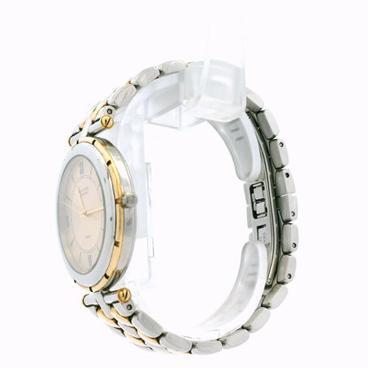 Van Cleef & Arpels 18k Yellow Gold and Stainless Steel Champagne Dial Watch