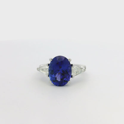 18k White Gold Oval Cut Tanzanite and Round and Tapered Baguette Diamond Cocktail Ring
