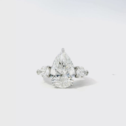 Platinum GIA Certified 7.48ctw Pear Cut Natural Diamond 3 Stone Ring