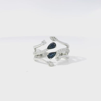 14k White Gold 0.45ct Sapphires and 0.30ct Round Brilliant Diamond in a Bypass Ring
