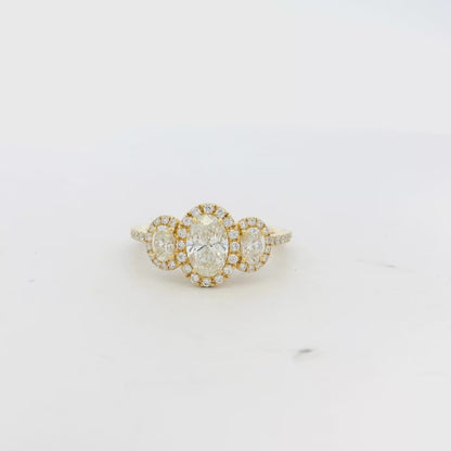 18k Yellow Gold 1.08ct Three-Stone Oval Diamond and 0.35ct Round Brilliant Diamonds Ring