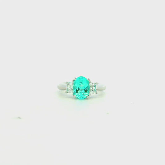 Platinum 1.66ct Oval Paraiba Tourmaline and 0.64ctw Diamond Three-Stone Ring
