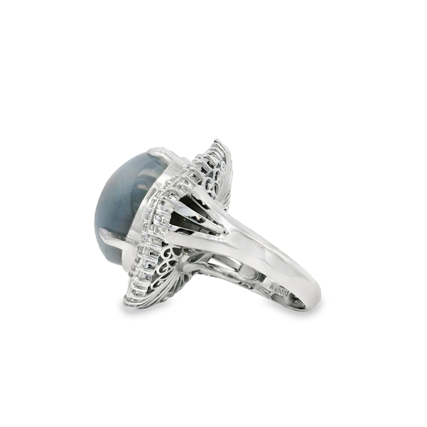Platinum 46.44ct Sapphire Star accented by 1.52ct Round Brilliant and Baguette Diamond Ring