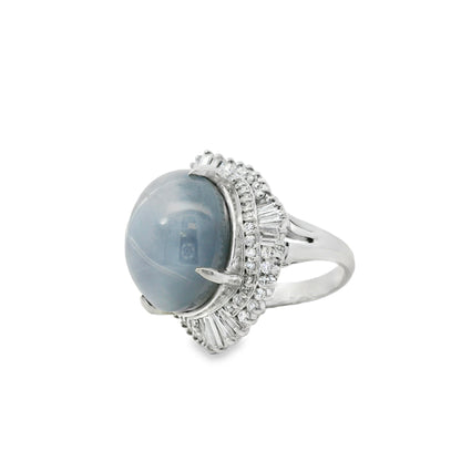 Platinum 46.44ct Sapphire Star accented by 1.52ct Round Brilliant and Baguette Diamond Ring