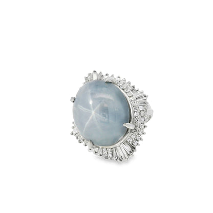 Platinum 46.44ct Sapphire Star accented by 1.52ct Round Brilliant and Baguette Diamond Ring