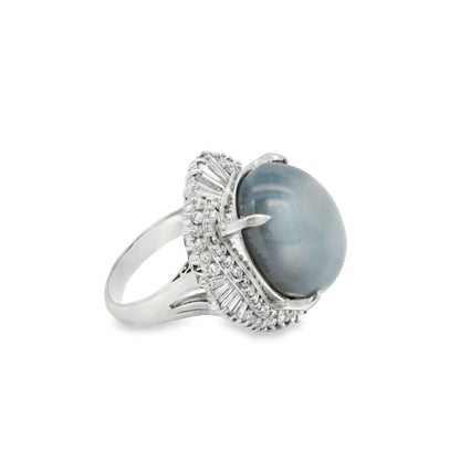 Platinum 46.44ct Sapphire Star accented by 1.52ct Round Brilliant and Baguette Diamond Ring