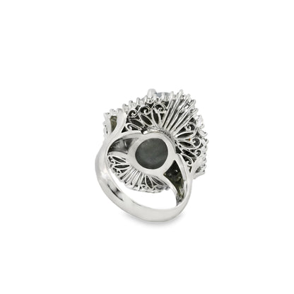 Platinum 46.44ct Sapphire Star accented by 1.52ct Round Brilliant and Baguette Diamond Ring