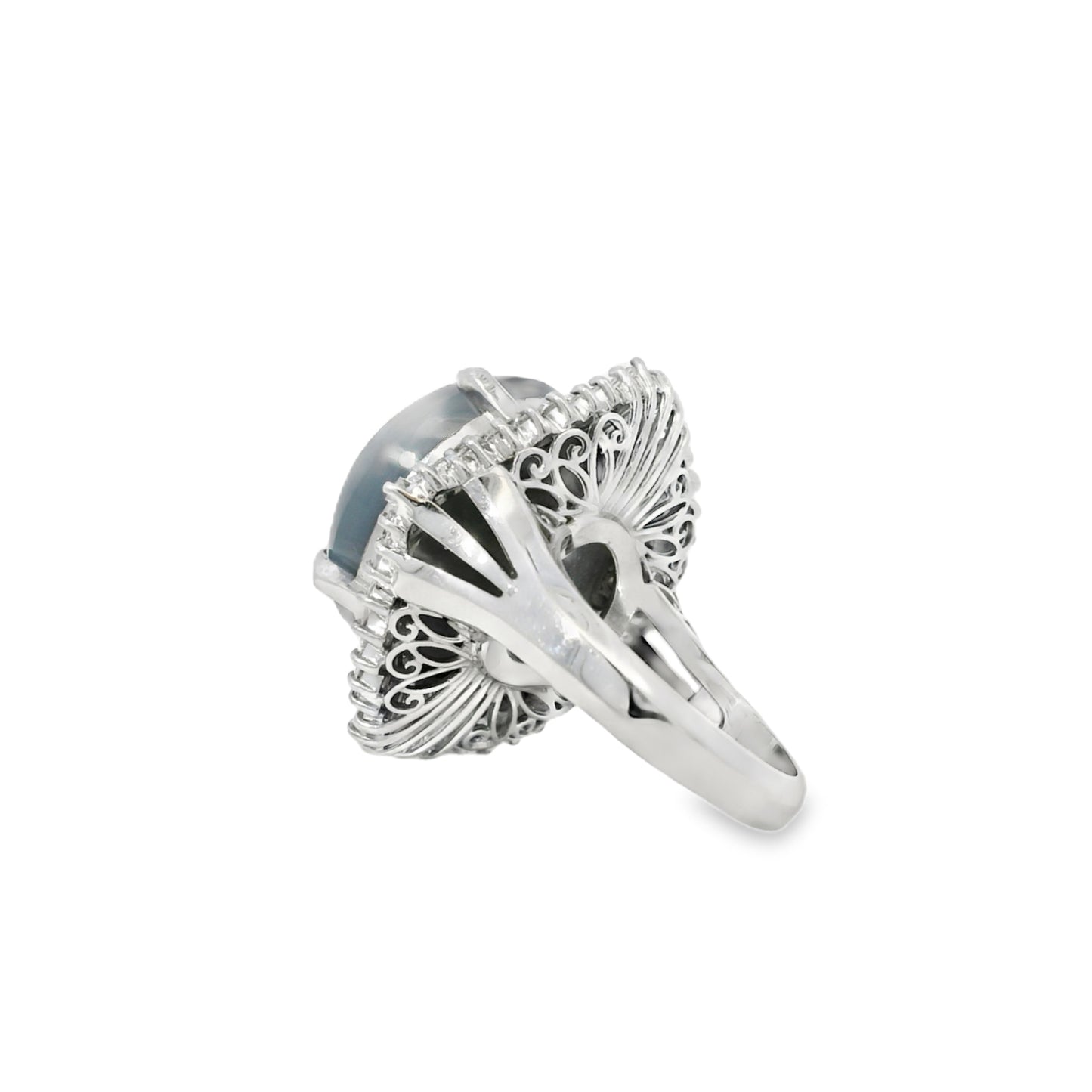 Platinum 46.44ct Sapphire Star accented by 1.52ct Round Brilliant and Baguette Diamond Ring