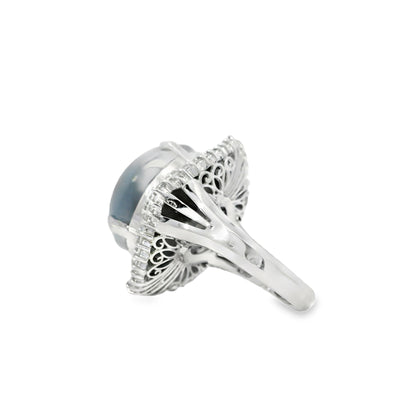 Platinum 46.44ct Sapphire Star accented by 1.52ct Round Brilliant and Baguette Diamond Ring