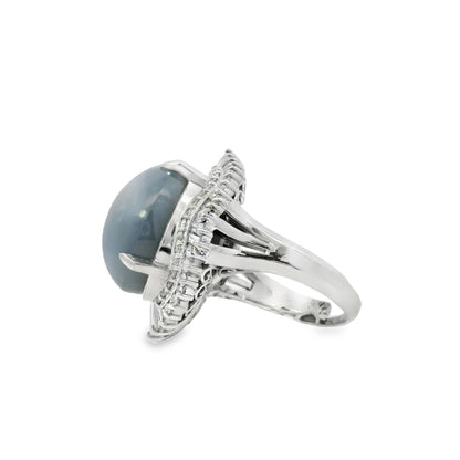 Platinum 46.44ct Sapphire Star accented by 1.52ct Round Brilliant and Baguette Diamond Ring