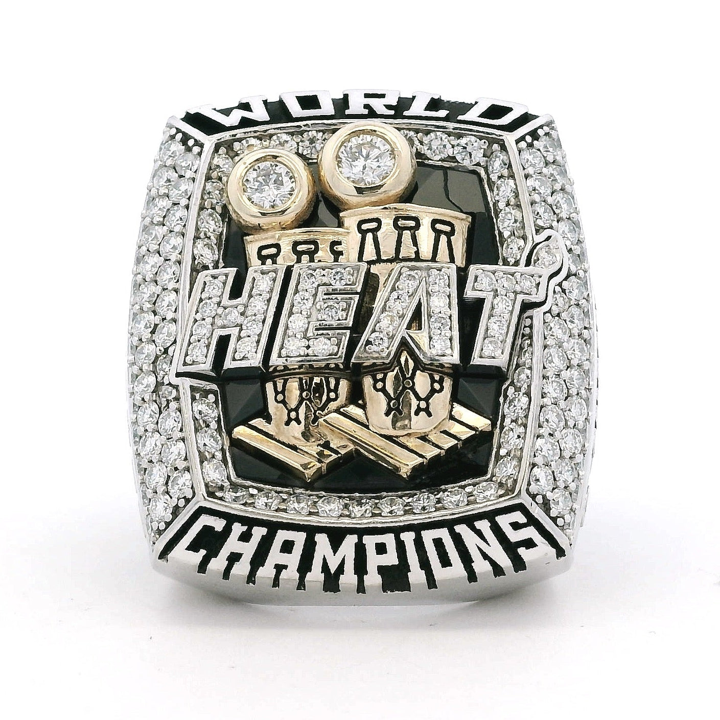 Championship ring with 'HEAT' and 'CHAMPIONS' text on a white background