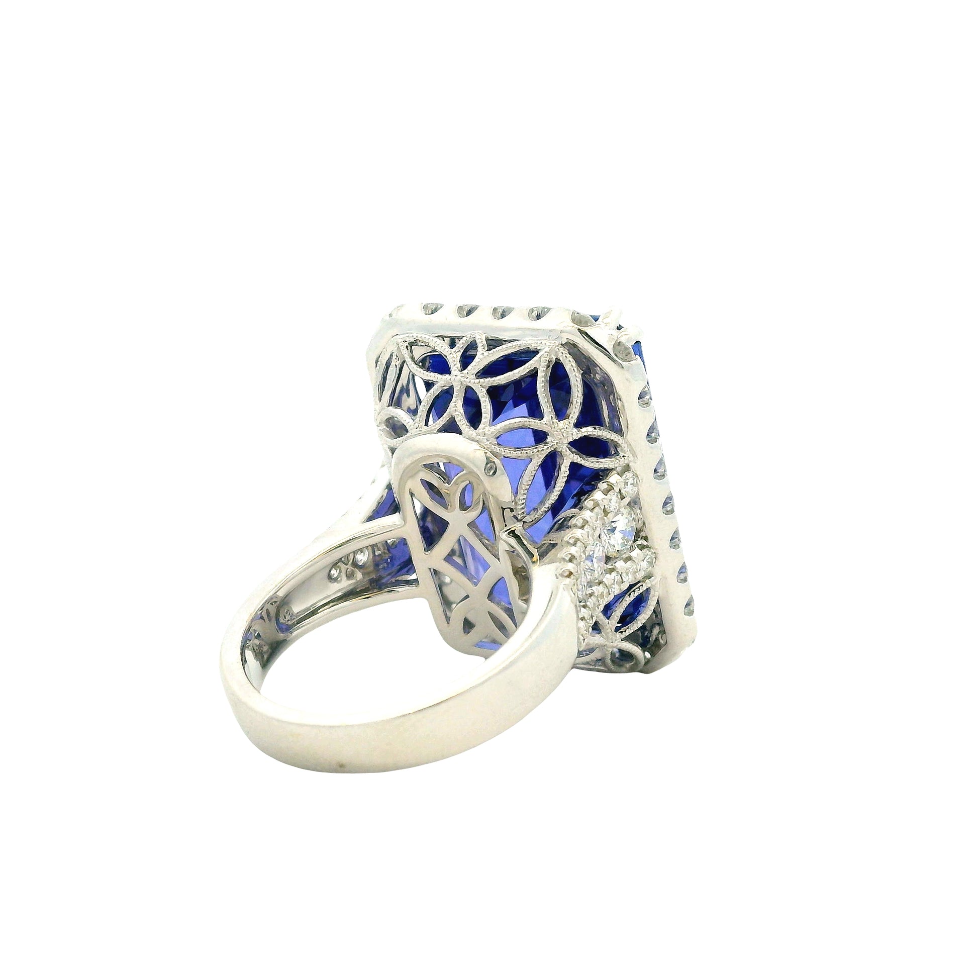 18k White Gold 34.72ct Emerald Cut Tanzanite and 2.26ctw Diamond Halo Cocktail Ring — photo 11 of 15