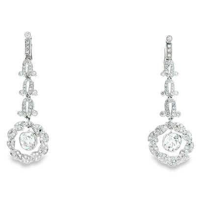 Platinum 3.88ctw Antique Cushion Cut Natural Diamond Dangle Earrings — front view, pair shown