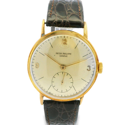 Patek Philippe Calatrava 18k Yellow Gold 35mm Champagne Dial Vintage Watch — front view