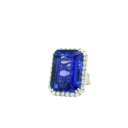18k White Gold 34.72ct Emerald Cut Tanzanite and 2.26ctw Diamond Halo Cocktail Ring — left three-quarter angle
