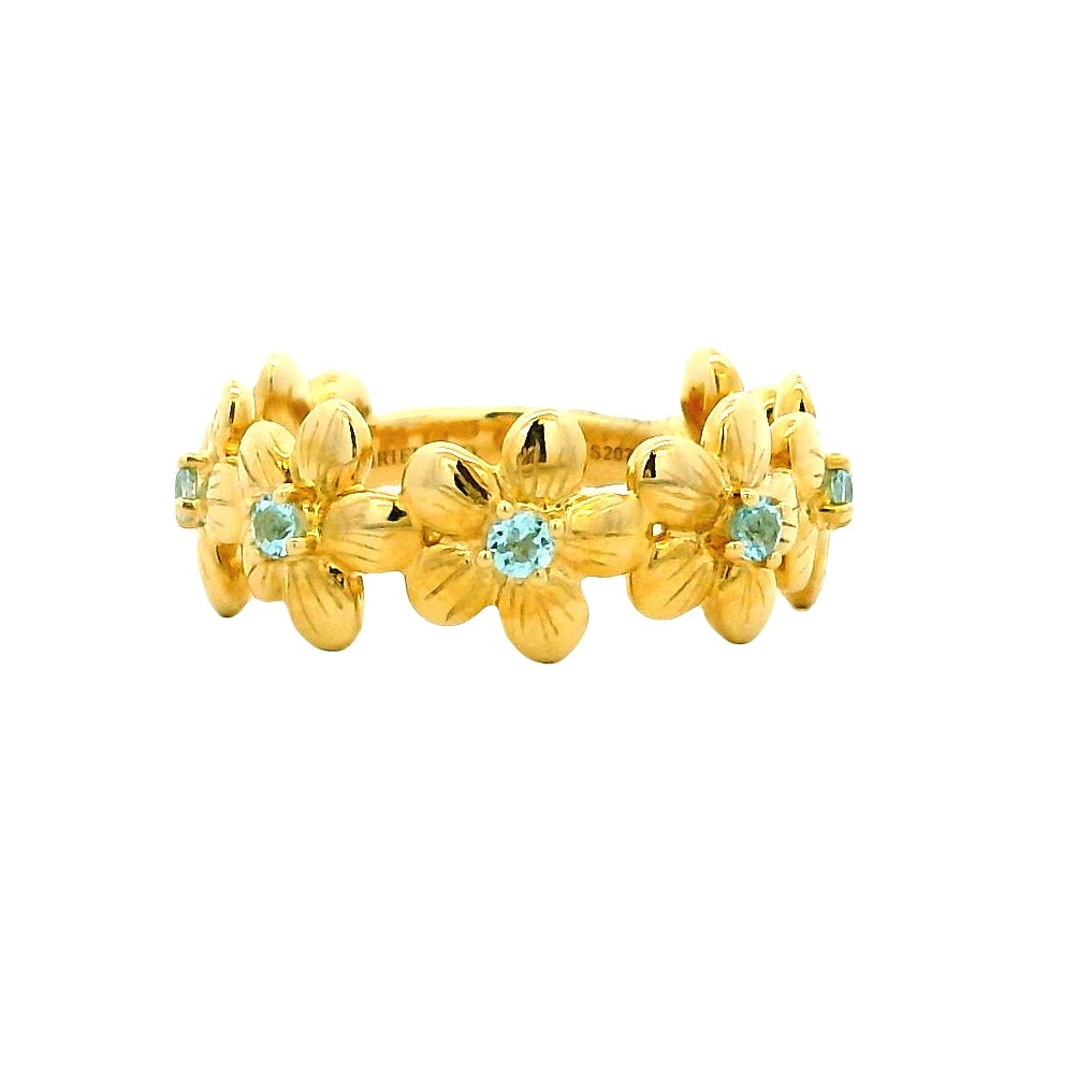 Gabriel and Co. 14k Yellow Gold 0.19ctw Swiss Blue Topaz Floral Stackable Ring — left three-quarter angle
