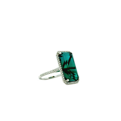 14k White Gold Blue Tourmaline and 0.34ctw Diamond Halo Ring — left three-quarter angle