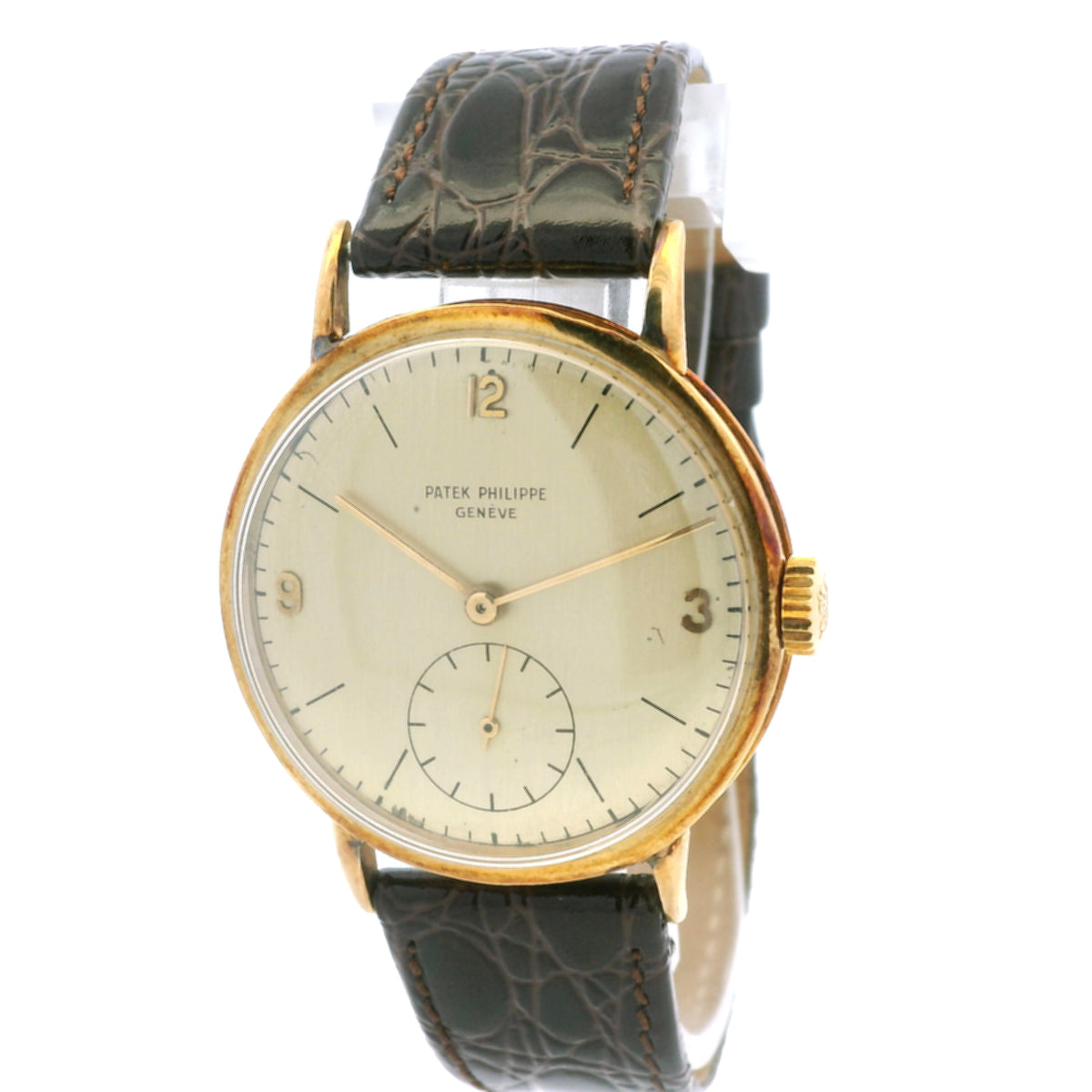 Patek Philippe Calatrava 18k Yellow Gold 35mm Champagne Dial Vintage Watch — left side three-quarter view