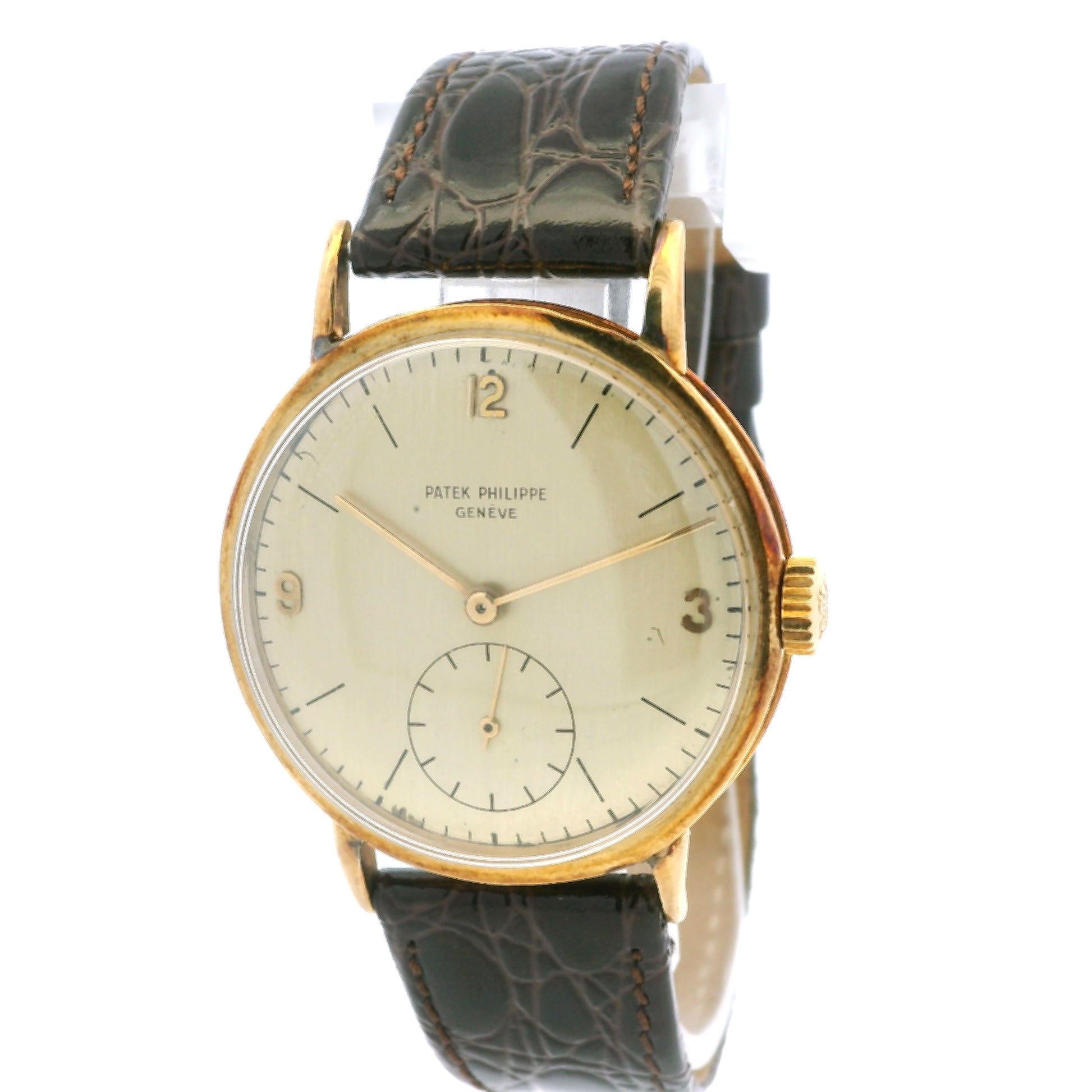 Patek Philippe Calatrava 18k Yellow Gold 35mm Champagne Dial Vintage Watch — left side three-quarter view