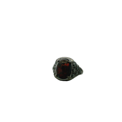 18k White Gold 1.50ct Oval Black Opal and 0.50ctw Pavé Diamond Ring — left three-quarter angle