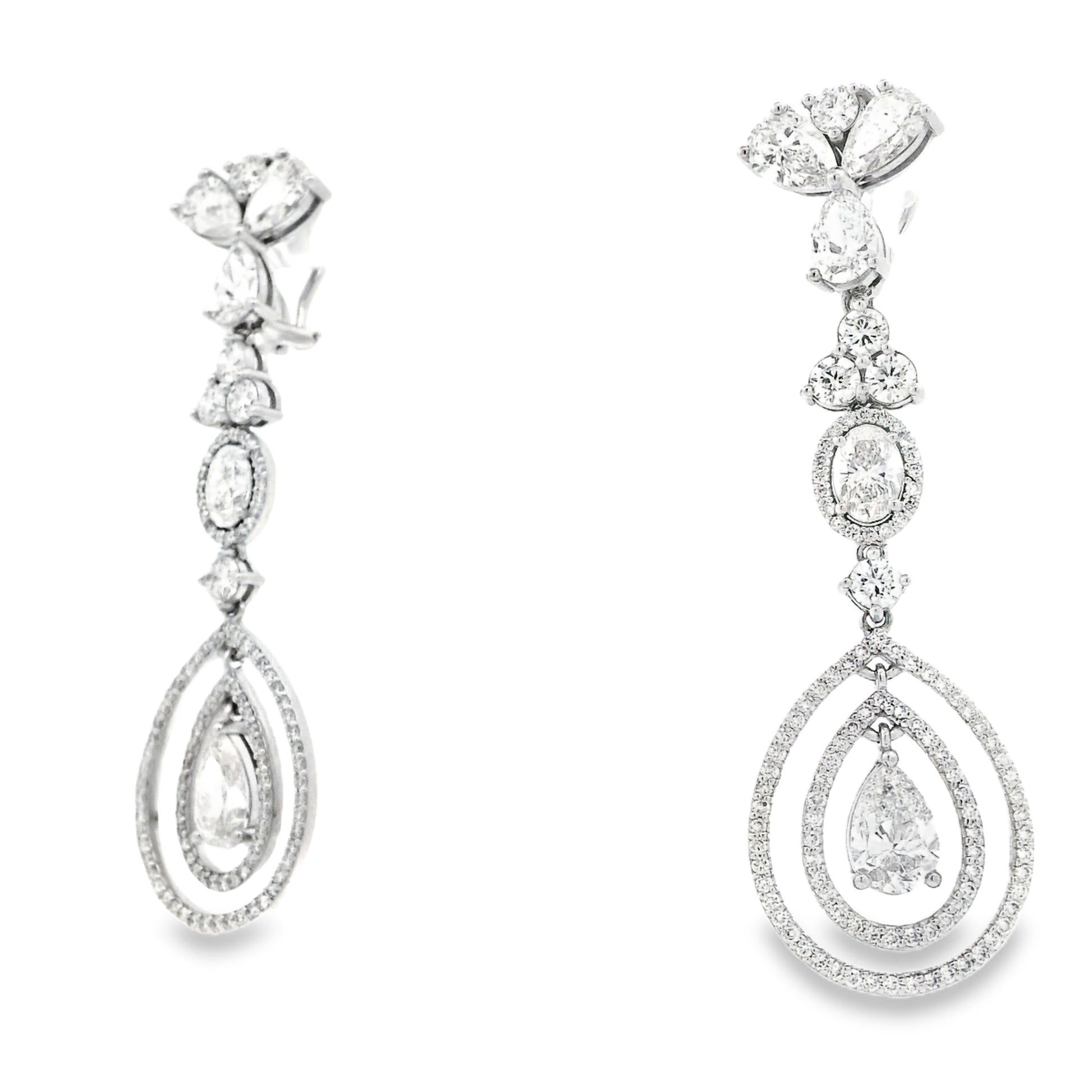 18k White Gold 12.68ctw Pear Oval and Round Brilliant Diamond Drop Earrings — left three-quarter angle