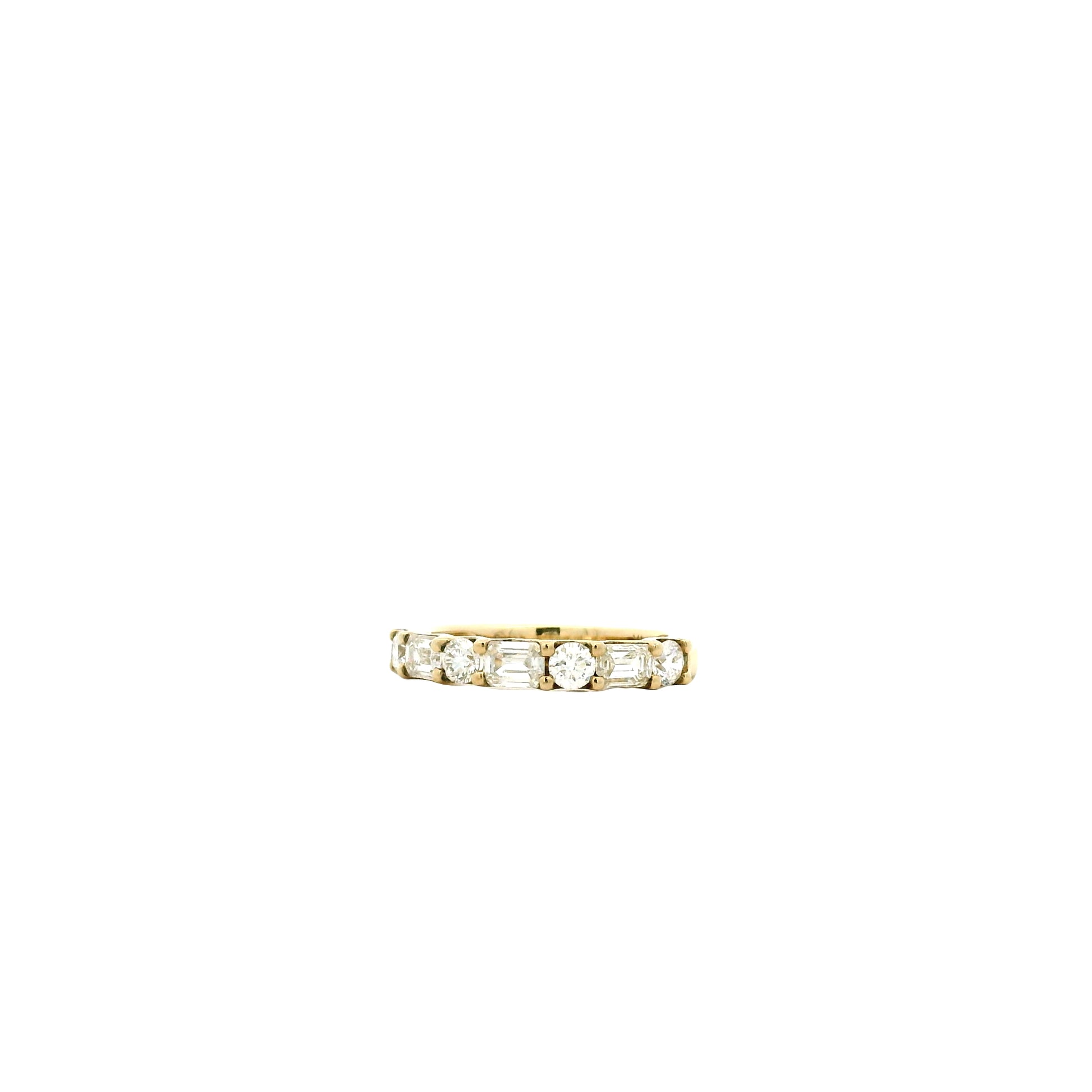 14k Yellow Gold 0.80ct Emerald Cut and 0.50ctw Round Brilliant Diamond Halfway Band Ring — left three-quarter angle