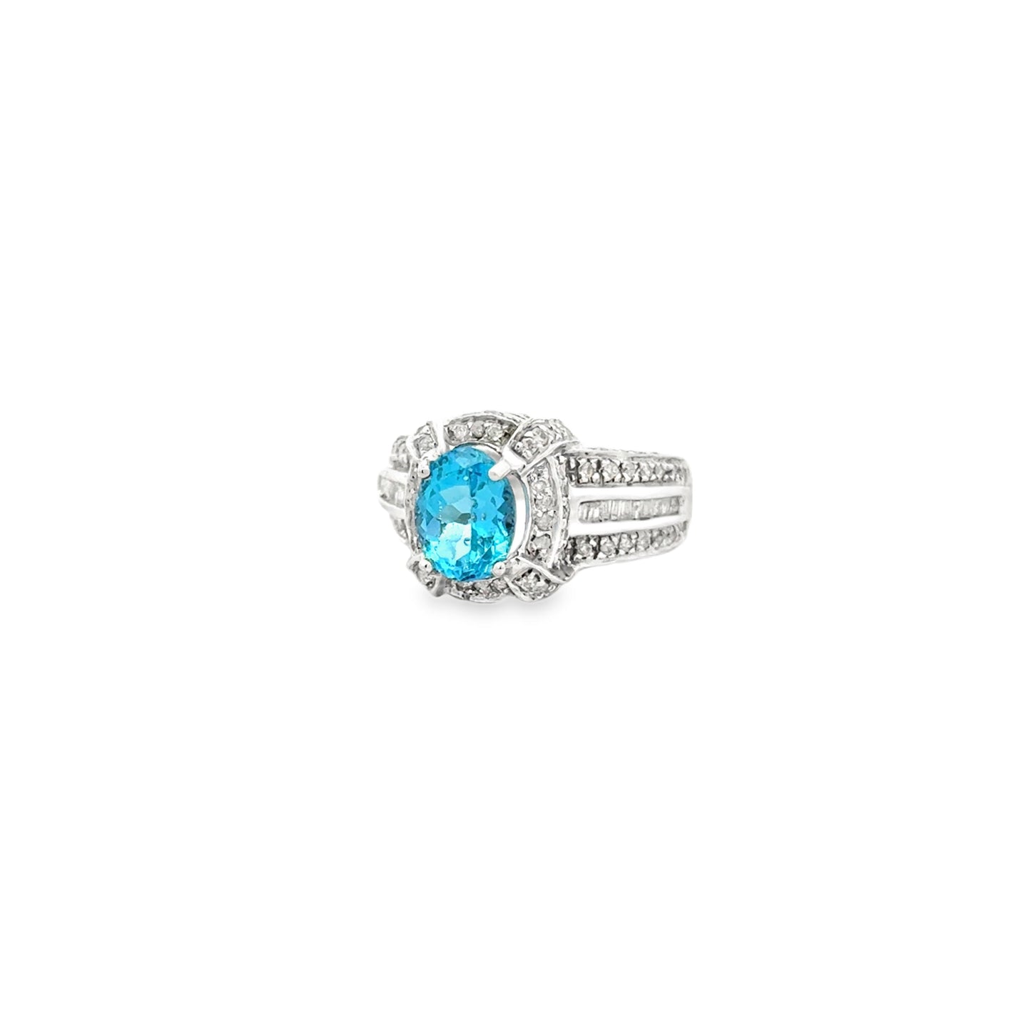 White Gold Oval Blue Gemstone Halo Cocktail Ring — left three-quarter angle