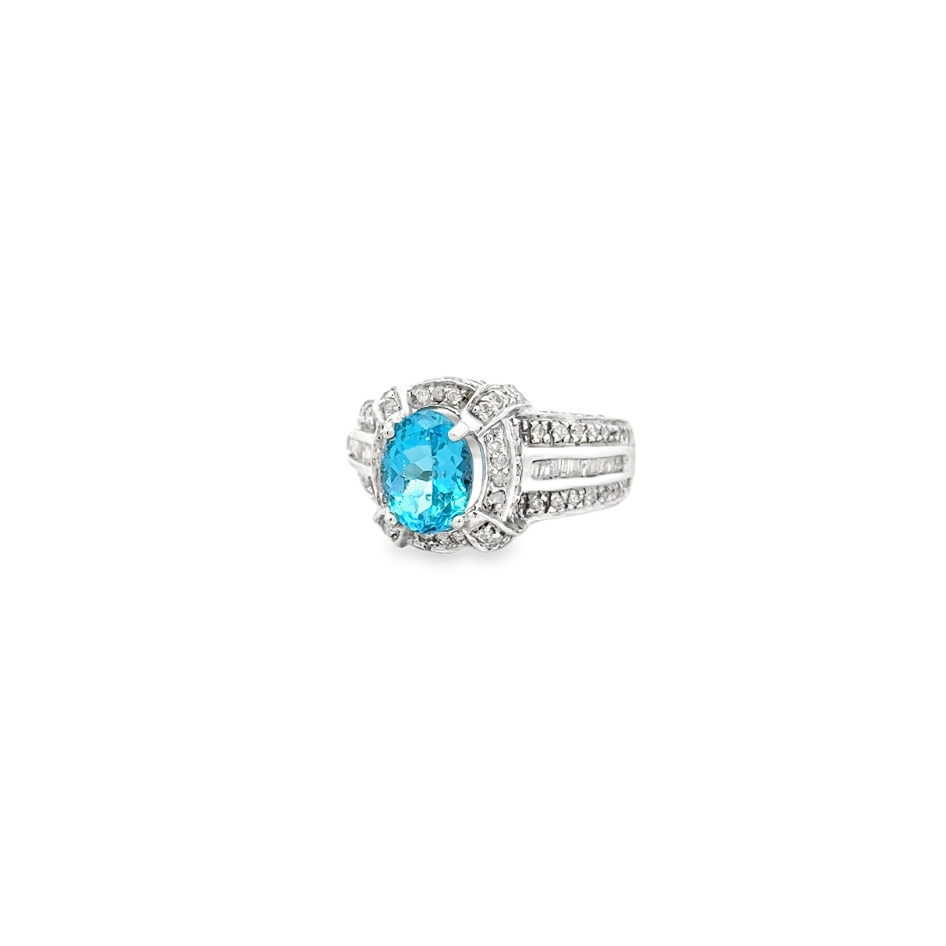 White Gold Oval Blue Gemstone Halo Cocktail Ring — left three-quarter angle