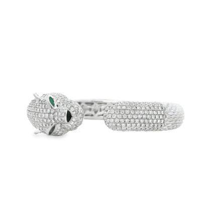 18k White Gold 0.31ctw Emerald and 10.57ctw Round Diamond Pavé Panther Hinged Bangle Bracelet — left three-quarter angle