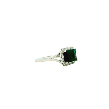 14k White Gold 3.54ct Emerald Cut Blue Tourmaline and 0.27ctw Diamond Halo Ring — left three-quarter angle