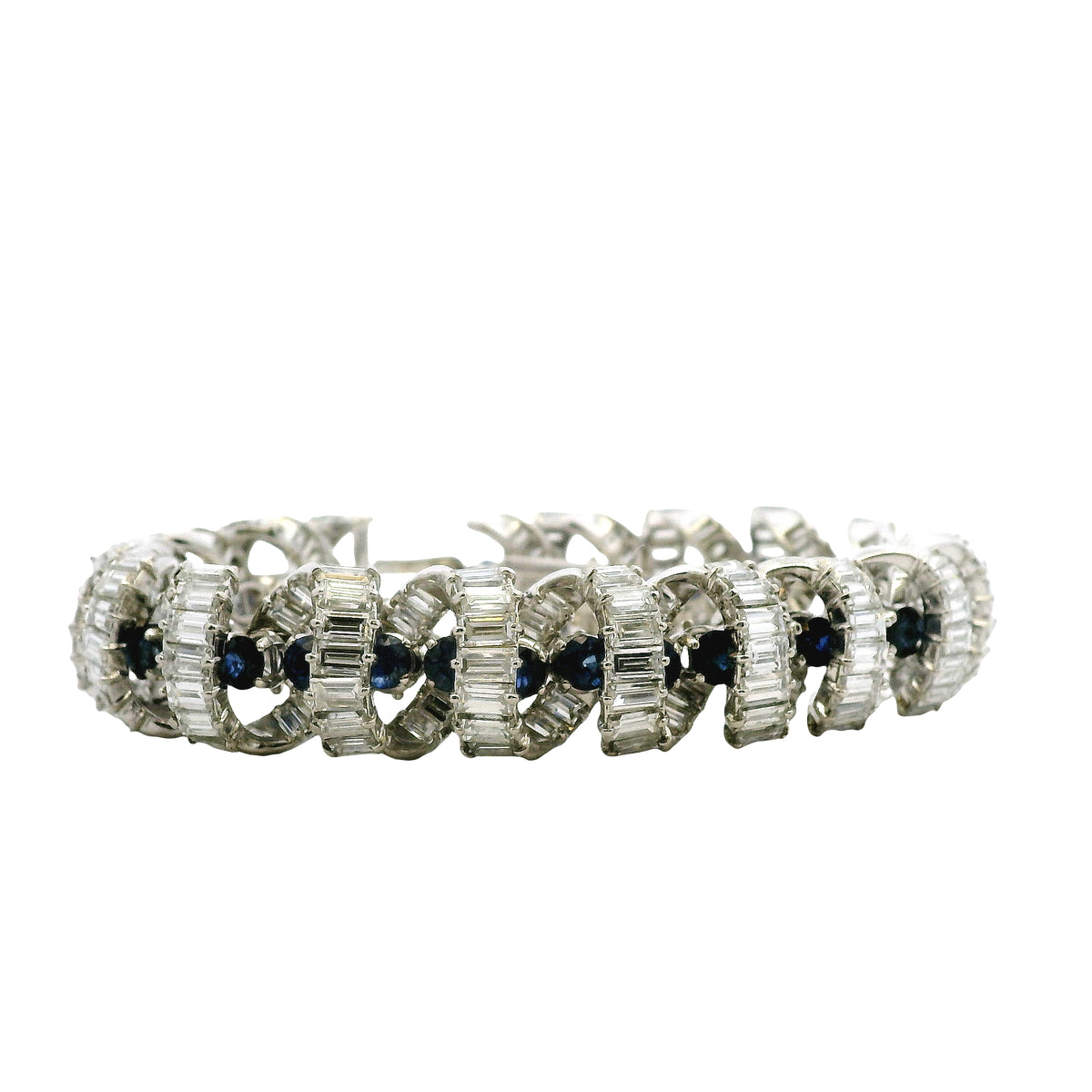 Platinum 25ctw Baguette Cut Diamond and Natural Blue Sapphire Interlocking Link Statement Bracelet — left three-quarter angle