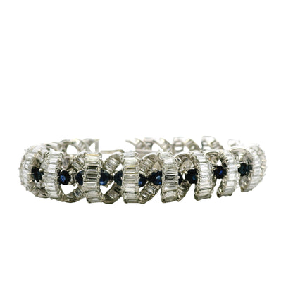 Platinum 25ctw Baguette Cut Diamond and Natural Blue Sapphire Interlocking Link Statement Bracelet — left three-quarter angle