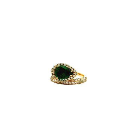 14k Yellow Gold 1.23ct Pear Cut Natural Emerald and 1.15ctw Diamond Halo Pavé Crossover Ring — left three-quarter angle