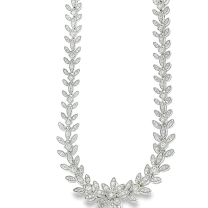 18k White Gold GIA Certified 19.58ct Paraiba Tourmaline & 6.58ctw Diamond Necklace — left three-quarter angle