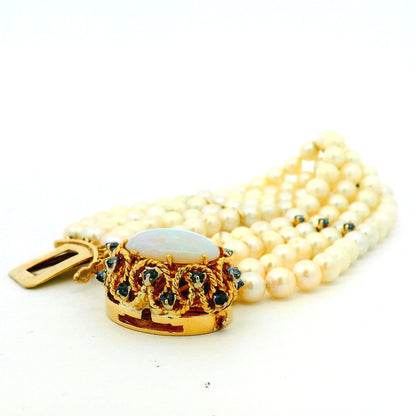 14k Yellow Gold 4-Strand Natural Pearl Bracelet with Opal and Natural Sapphire Cluster Centerpiece — left three-quarter angle
