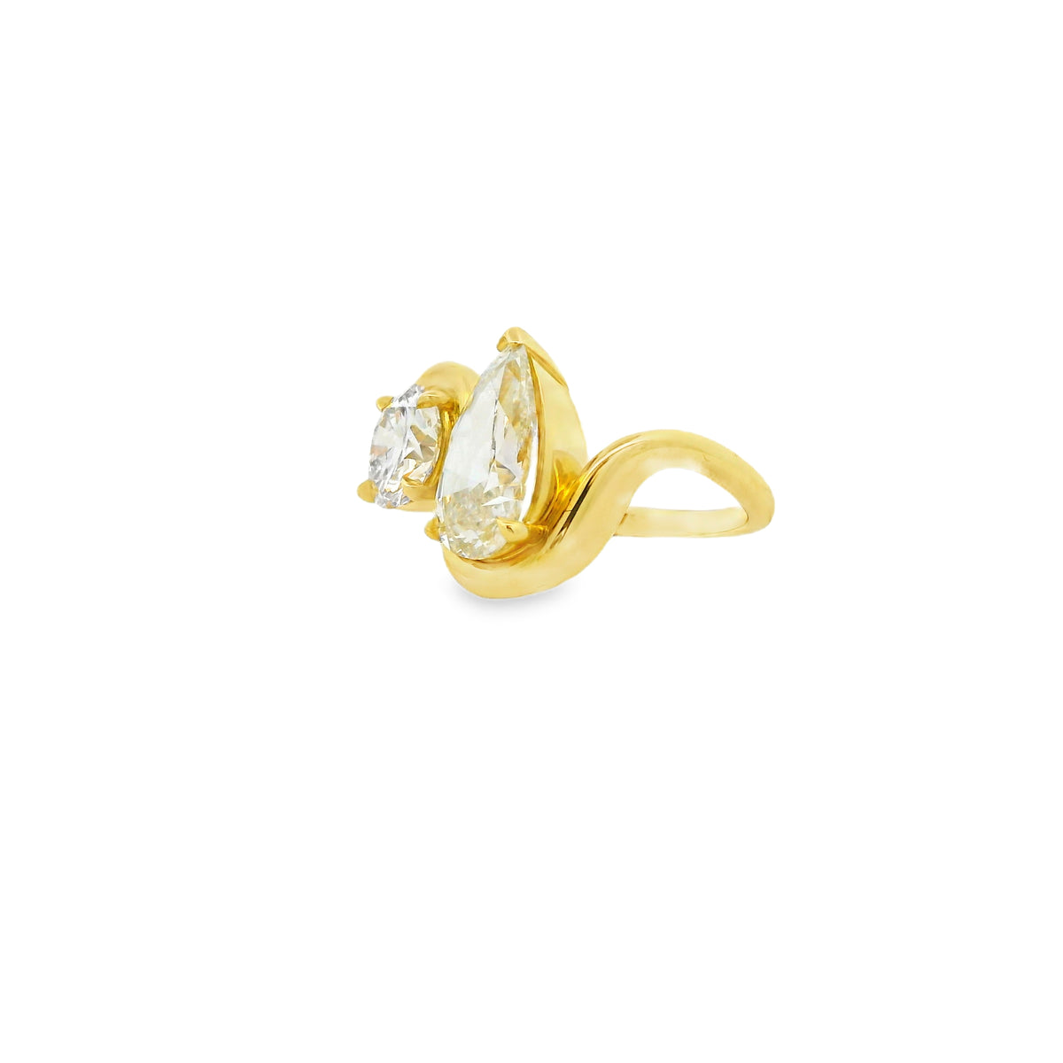 18k Yellow Gold 3.01ct Pear Cut and 1.47ct Round Cut Two-Stone Diamond Ring — left three-quarter angle