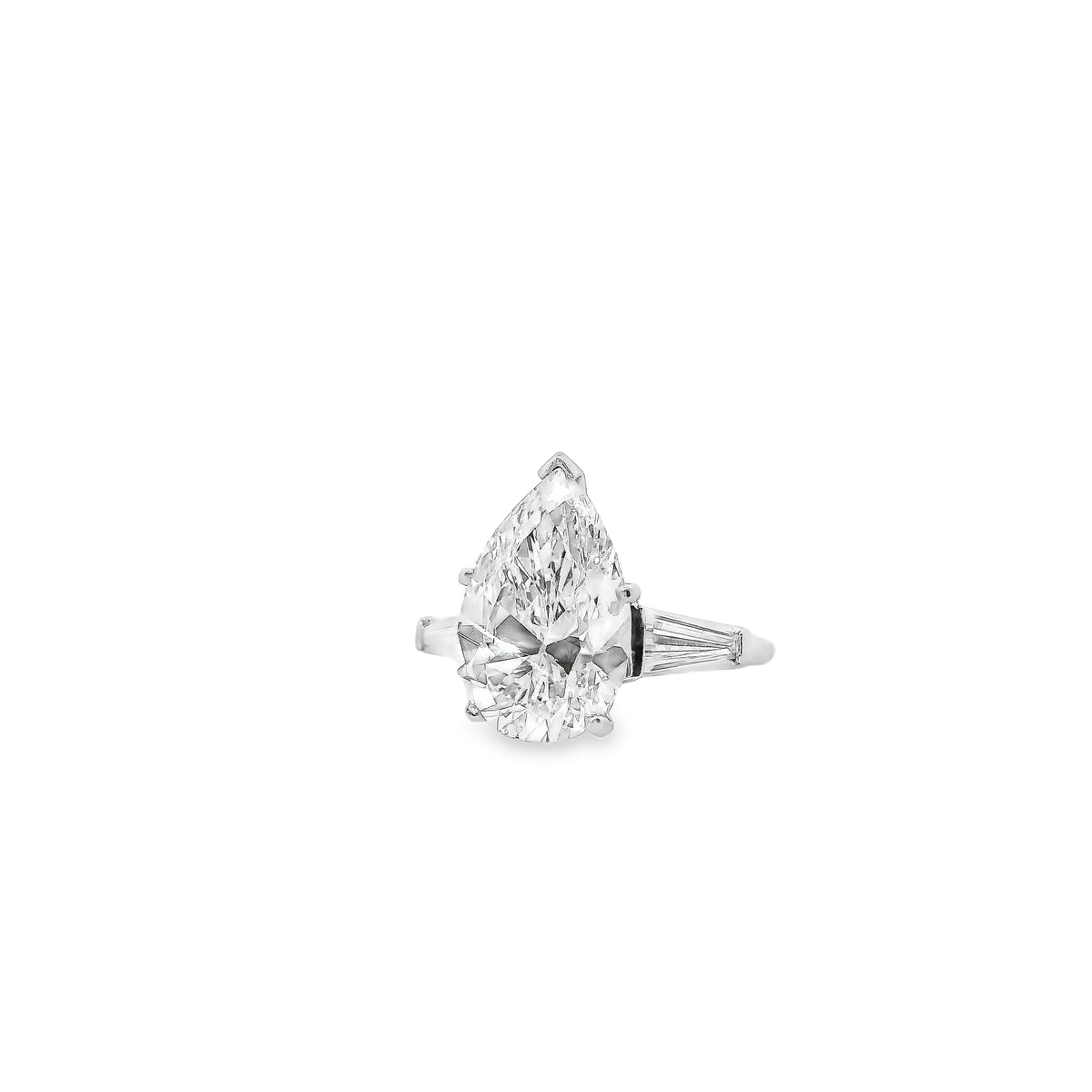 Platinum 4.69ct GIA Pear Cut Diamond Tapered Baguette Three-Stone Engagement Ring — right three-quarter angle