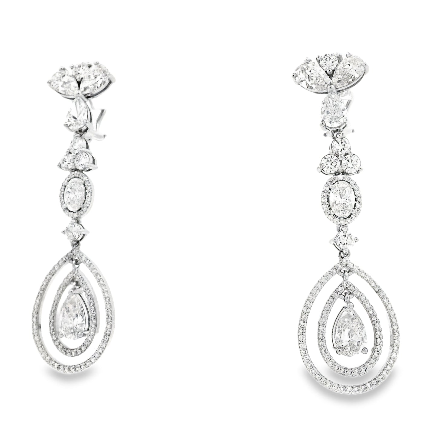 18k White Gold 12.68ctw Pear Oval and Round Brilliant Diamond Drop Earrings — right three-quarter angle